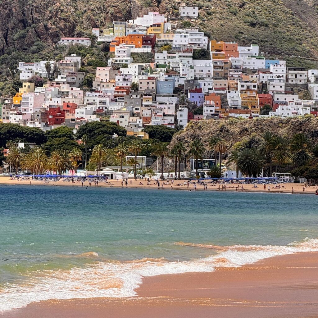 San Andrés above Las Teresitas, Tenerife — colorful hillside houses and calm turquoise water.