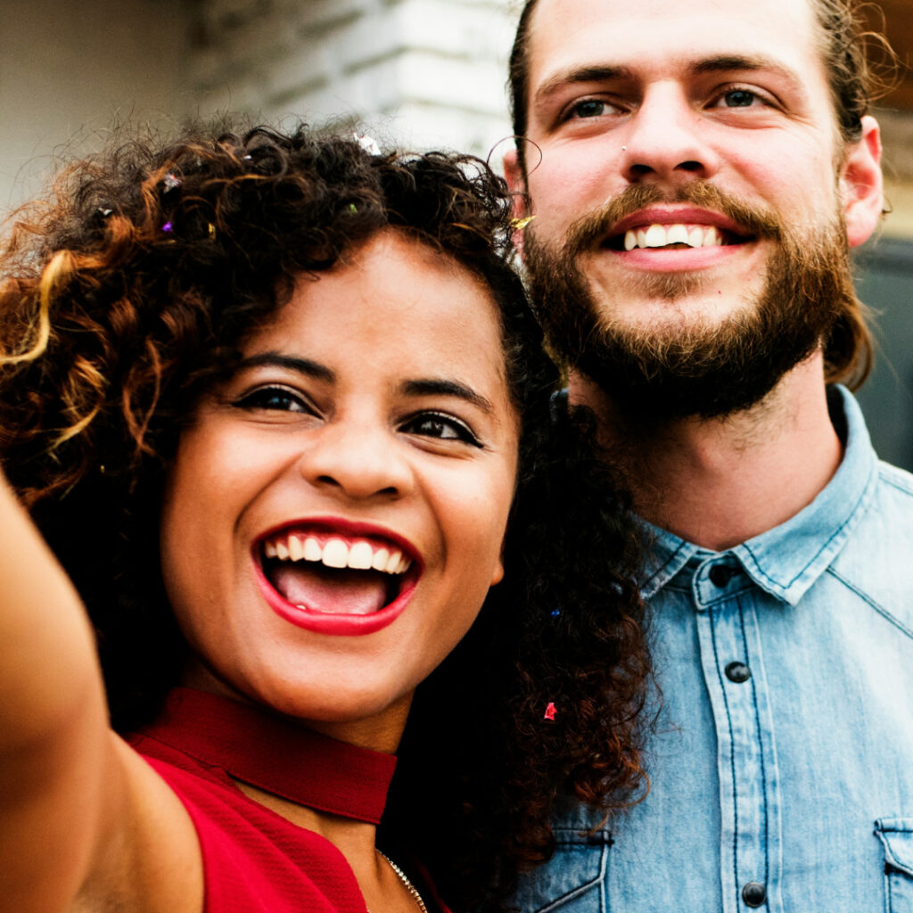 Couple taking a selfie together, enjoy adult only hotel.